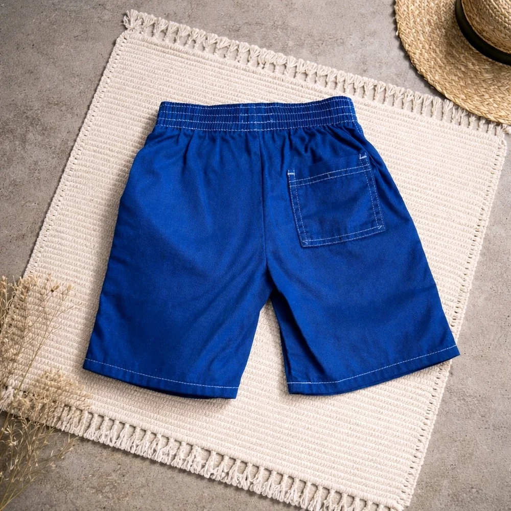 OshKosh B'gosh blue swim trunks size 5 with white stitching